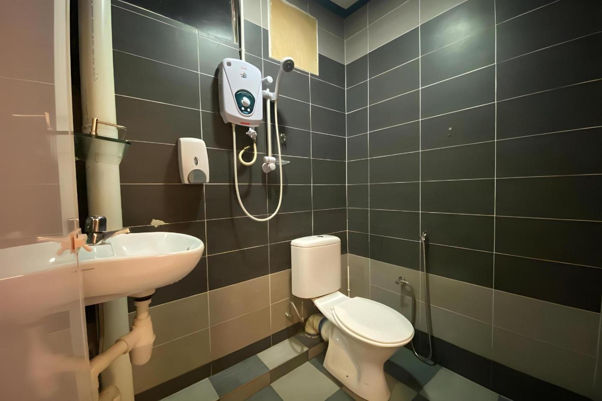 Super Oyo 89807 My Budget Home Batu Feringgi Buitenkant foto